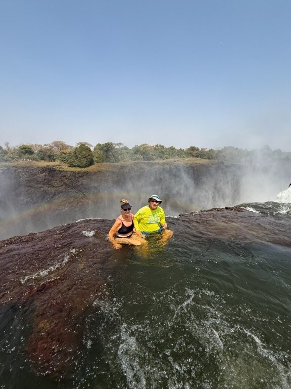 Deanna & Willy at the edge of Victoria Falls Deanna & Willy at the edge of Victoria Falls
