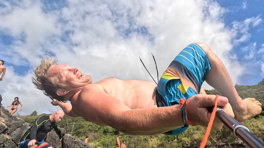 Kirk flipping off the Rock at Waimea Kirk flipping off the Rock at Waimea