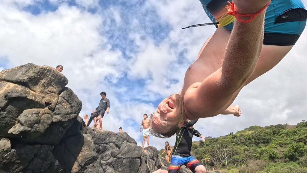 Kirk flipping off the Rock at Waimea Kirk flipping off the Rock at Waimea