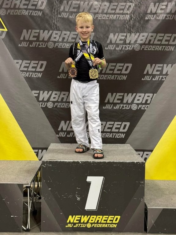 Declan on the podium Declan on the podium