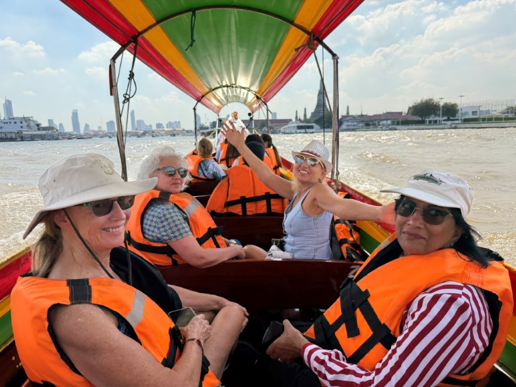Deanna, Izabella, Mila, and Merlin on the Chao Phraya River, Bangkok Deanna, Izabella, Mila, and Merlin on the Chao Phraya River, Bangkok