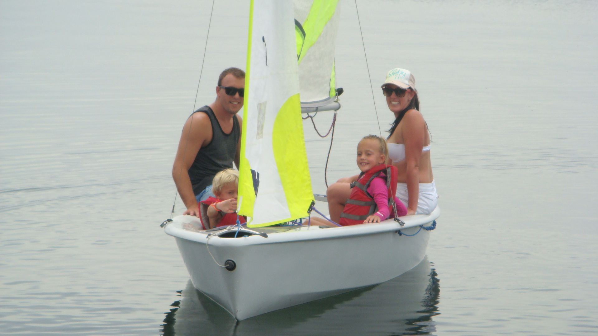 The McGhees in their sailboat