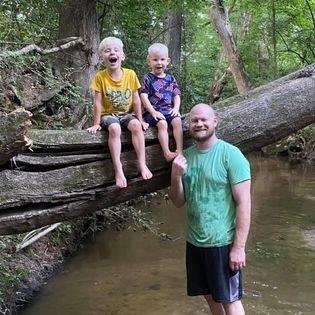 Chad and boys at the creek