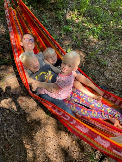 Jaime and kids in hammock