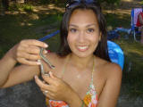 Melanie holds a garter snake at Hume Lake